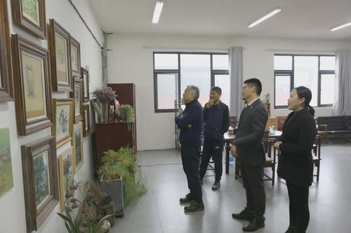 河南省美术家协会副主席化建国教授,河南民安集团董事长张信志先生一行莅临郑州四禾美术学校参观考察